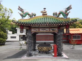 The small but vibrantly colorful pavilion is home to eight dragons