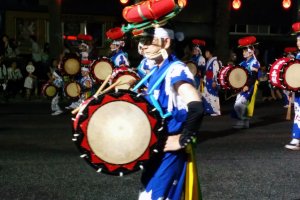 The traditional hat and costume is worn by this performer