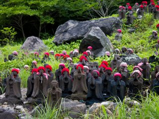 Hundreds of Jizo statues flank the path leading to the Killing Stone.