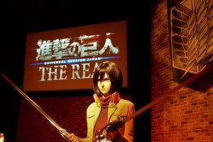 The Attack on Titan attraction features a number of life like costumed figures.