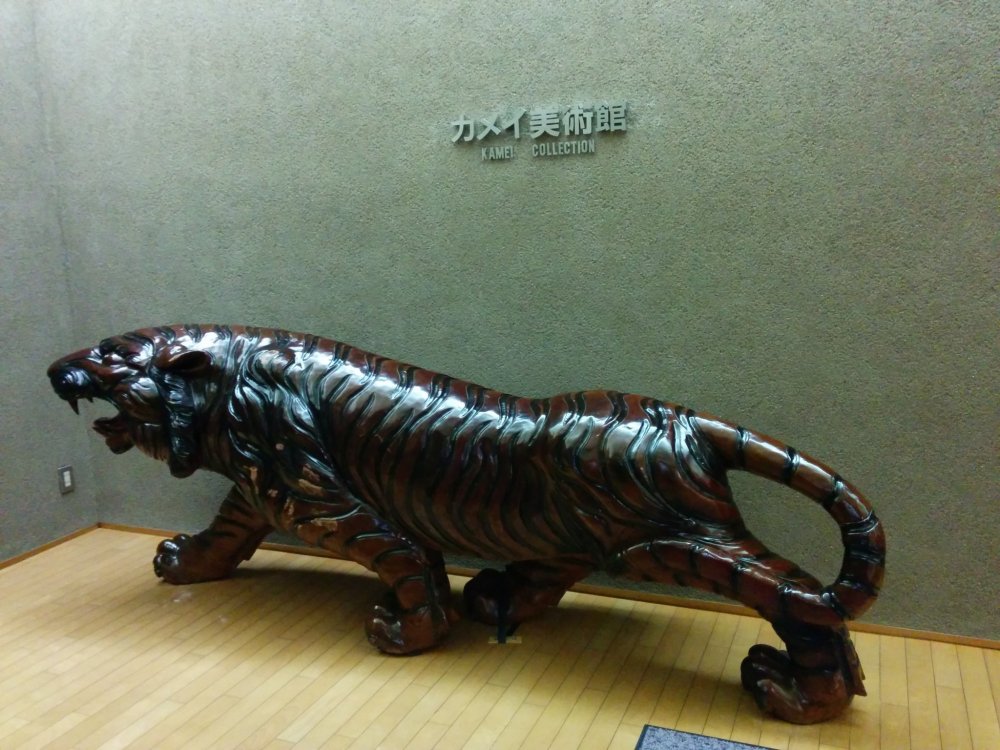 A tiger greets you outside the elevator