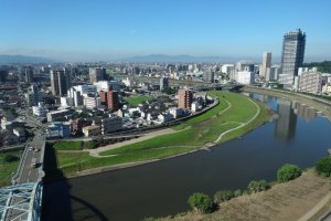 View of Kumamoto&#39;s Shirakawa river from the rooms of the ANA New Sky Hotel