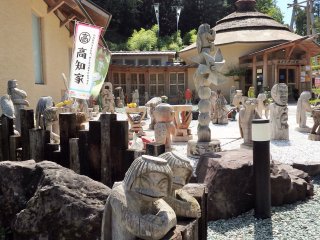 In front of the museum are hand-carved kappa (and various other creations) in all shapes, sizes and positions.
