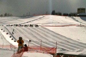Tube-sledding at Takino Snow World