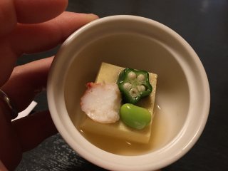 An appetizer consisting of tofu and okura