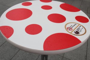 Of course the tables are even covered in red polka dots.