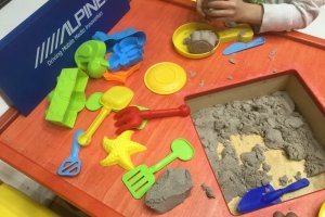 Sand table to keep little hands busy.