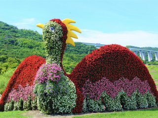 A large bird with the flowers