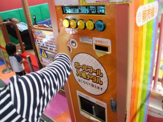 The token machines and the ticket machine for the ball pit look like this