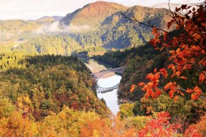 Colorful autumn scenery at Tadami River Bridge #1