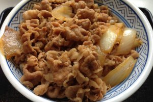 Gyudon is a donburi dish of rice covered by beef and onions