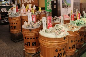 Uchidas Kyoto style pickle shop: The display in wooden barrels inspires you to buy something.