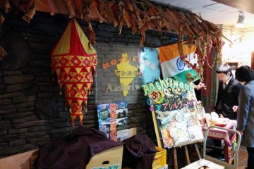<p>The decorations and the music really make you feel you are not in Japan for a moment. And this is just the entrance!</p>