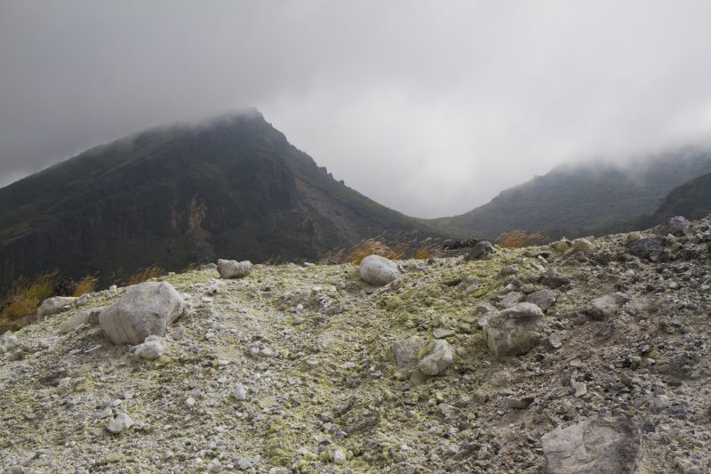 <p>Mt. Karakuni&nbsp;scrapes through the clouds</p>