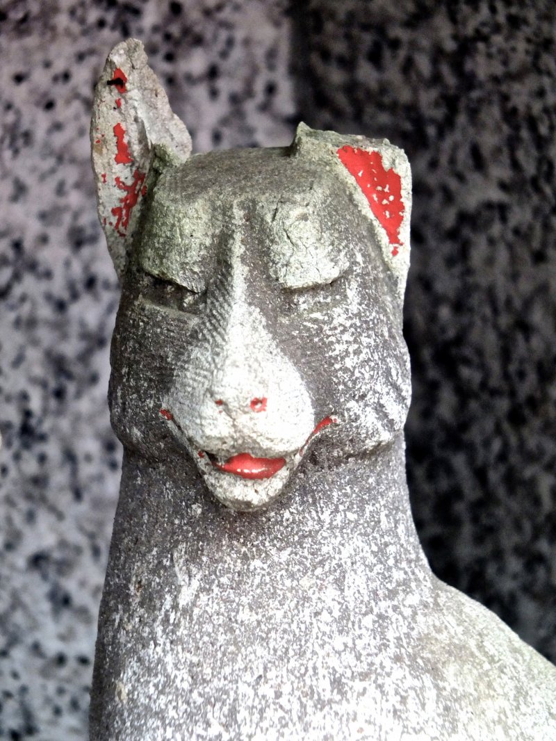 <p>Many of the fox statues have lost their sharp ears; this one now looks likes a llama</p>