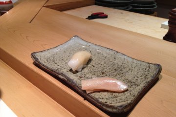 <p>Squid and some white fish nigiri sushi</p>