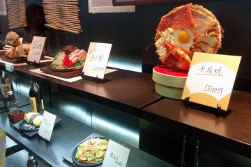 <p>Food display window outside the store.</p>
