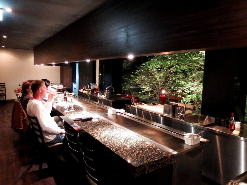 Inside &#39;Beef MIKAKU&#39;. Looks nice and a western couple was enjoying the perfect view from the window