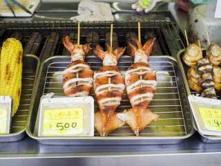 Fresh grilled squid on sale.
