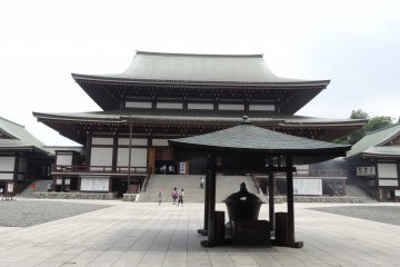 <p>The large central wooden Japanese building</p>