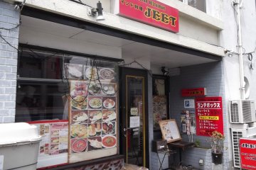 <p>Look for the restaurant covered in curries</p>