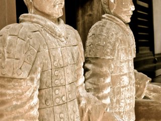 These tall wooden statues had no sign to tell me what they are