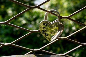 <p>This lovers&#39; padlock on a fence reminds me of the Pont des Arts Bridge in Paris</p>