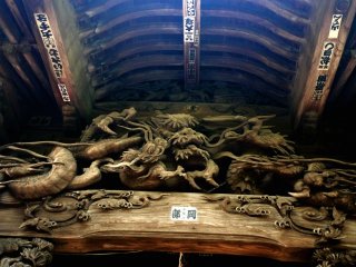 A fantastical dragon broods under the eaves