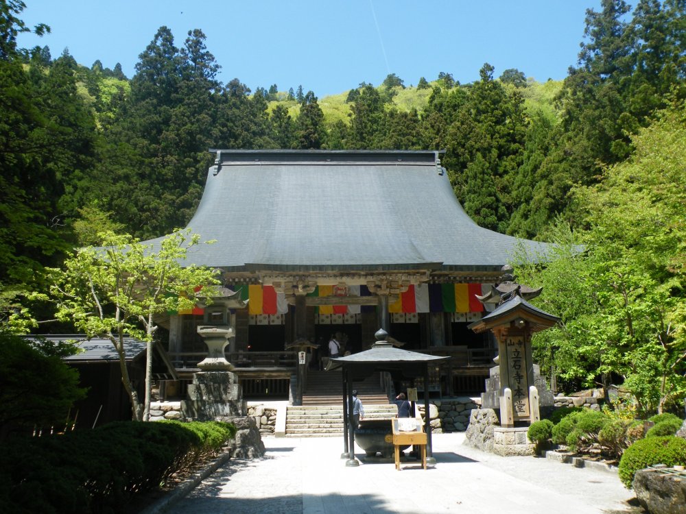 The Konpon-chudo is the main hall of Yamadera and can be reached after a few minutes of climbing the first set of steps. It was built in 1356.