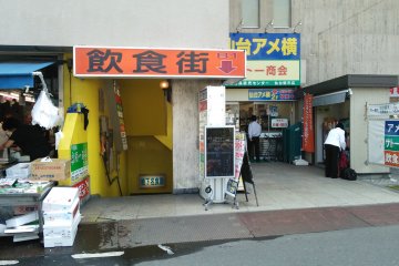 <p>The restaurant isn&#39;t obvious, but look out for the orange sign and head down the stairs to find it</p>