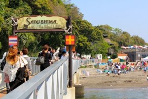 Beachgoers disembark Mikasa ferry boat to&nbsp;Sarushima Island in Yokosuka