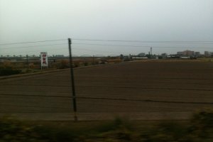 Fields on a cloudy day from the Kintetsu