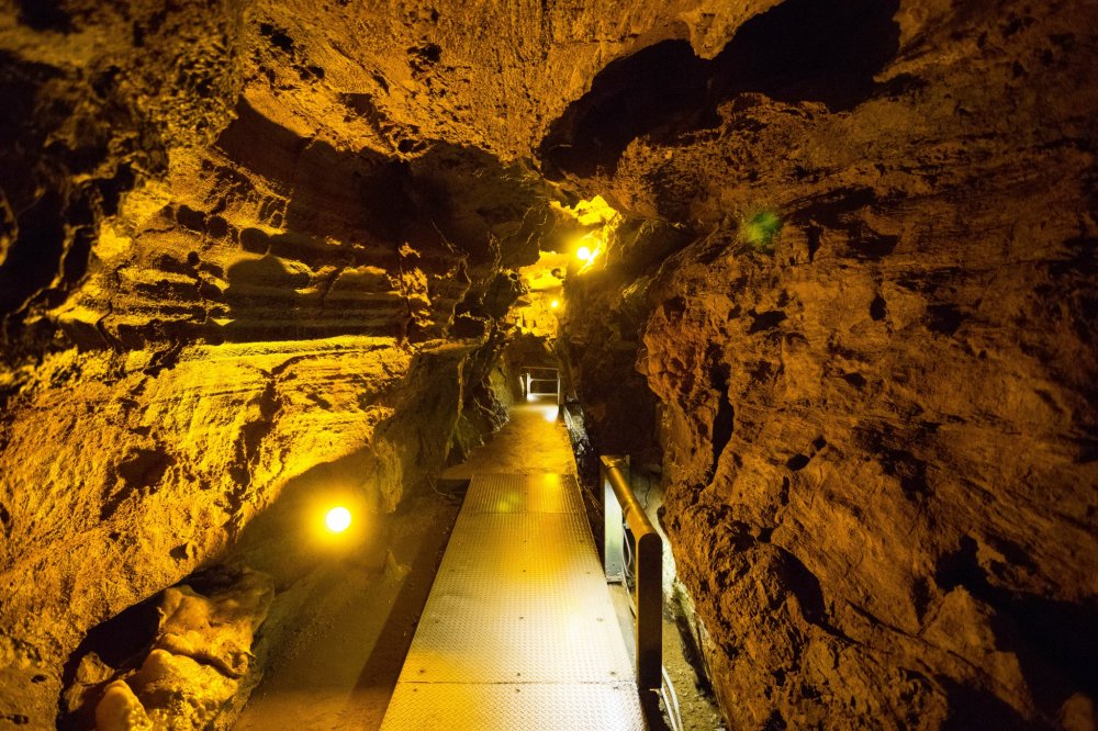 Illuminated path inside the cave