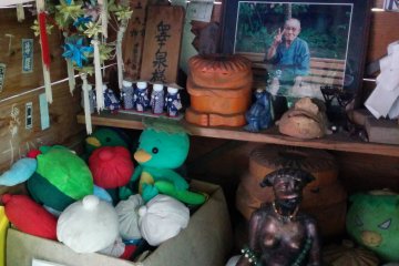 <p>Inside the kappa shrine are various kappa toys and figures</p>