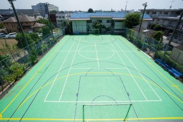 <p>The tennis/soccer court that residents can use</p>