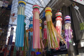 <p>Hanging kushidama streamers mark the beginning of the impressive Tanabata displays</p>