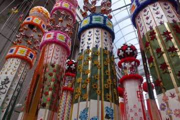 <p>The streamers hang from ten meter long bamboo poles in the city&#39;s covered shopping arcades</p>