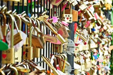 <p>The countless rows of couples who write their names on padlocks and attach them to a wall, a craze which seems to be spreading around Asia and perhaps the world!</p>