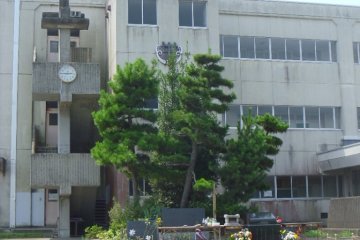 <p>The junior high school is still standing, empty, but saved for a little longer in case it&#39;s needed again for evacuation. Soon it will be torn down. Until then, the clock marks the time that the earthquake struck - 2:46pm</p>