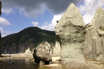 <p>Other worldly rock formations line the beach</p>