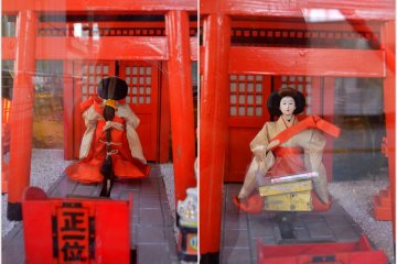 <p>Omikuji at Odaiba, Tokyo. This geisha-looking figure went into the shrine to retrieve my&nbsp;Omikuji.&nbsp;</p>