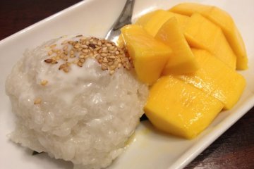 Fresh mango with sticky rice and coconut milk.