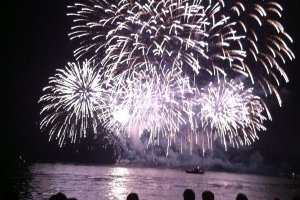 Fireworks light up a boat