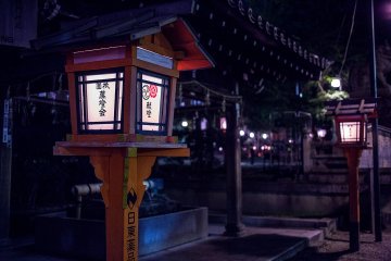 <p>Brightly lit lanterns line the way all across the grounds of the shrine</p>
