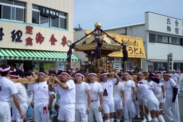 <p>Like any good traditional festival, there is a portable shrine being carried around.</p>