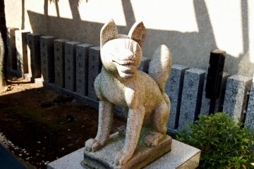 Handsome statue of guardian fox