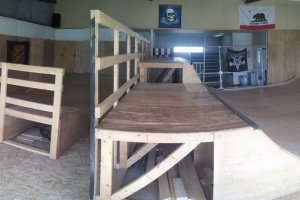 A panoramic shot of the indoor mini ramp area