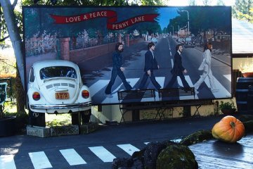 <p>The half a VW Bug sitting in the wall is the crowning touch to this picture near the entrance</p>