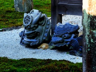 These roof ornament tiles symbolize a perspective of Buddhism