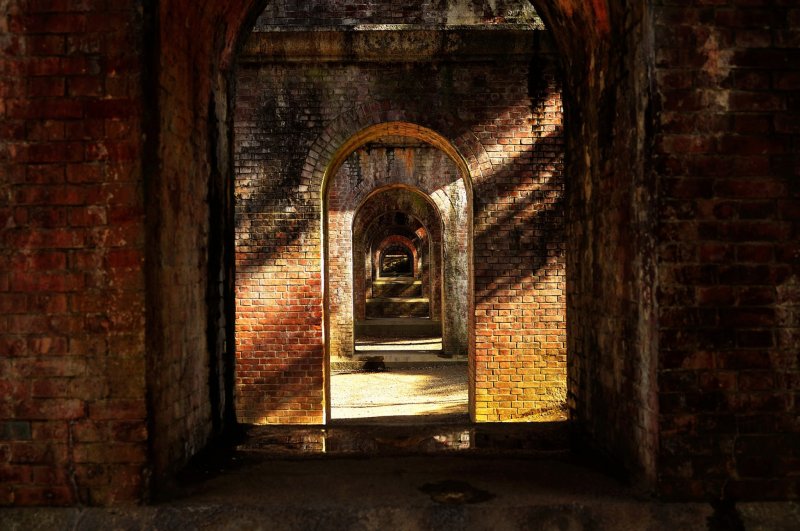 <p>Successive arches of the canal tunnel: A popular angle for photographers!</p>